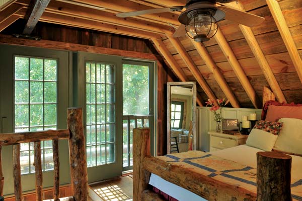 The home has no “finished” ceilings. “I wanted the lumber to be exposed, so it would look like I’d remodeled an old mill,” Guy says.
